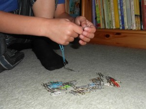 Creating and then dismantling paper-clip chains